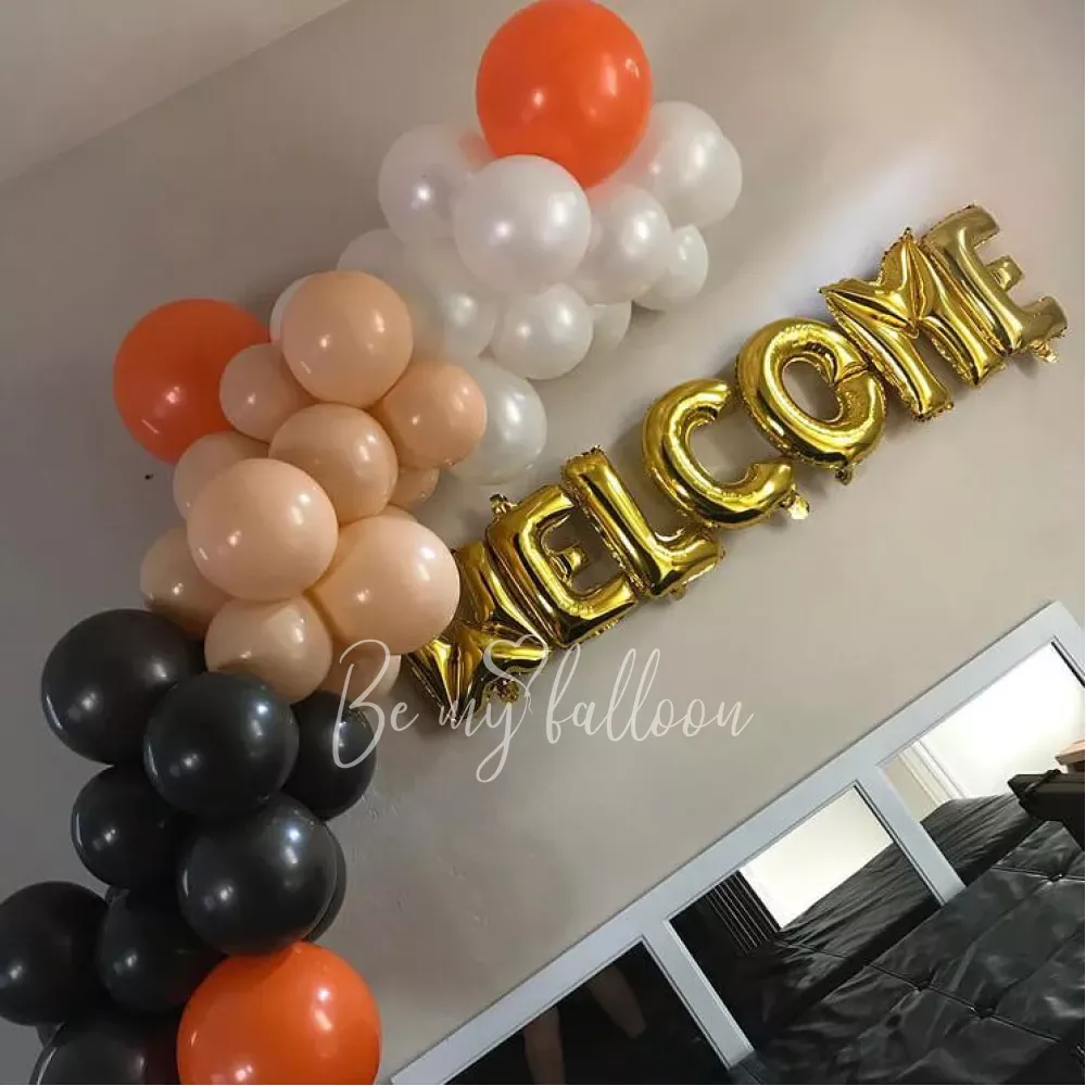 Welcome! organic balloon garland composition